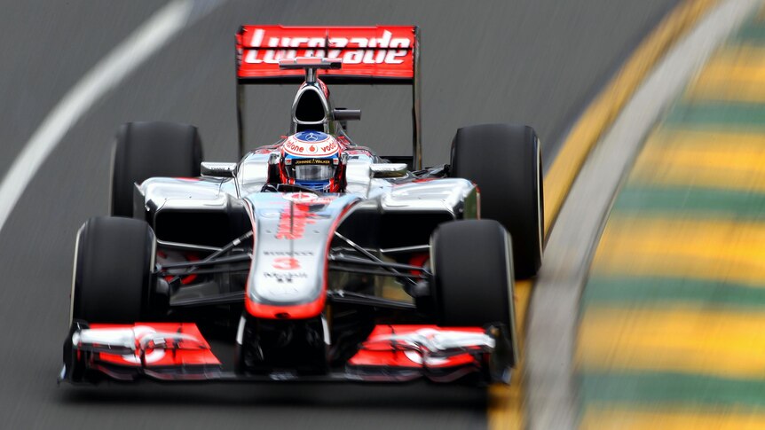 Jenson Button tears up Albert Park circuit during practice for the Australian F1 Grand Prix.