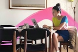 Jan Fran sitting at a computer for a story about hobbies