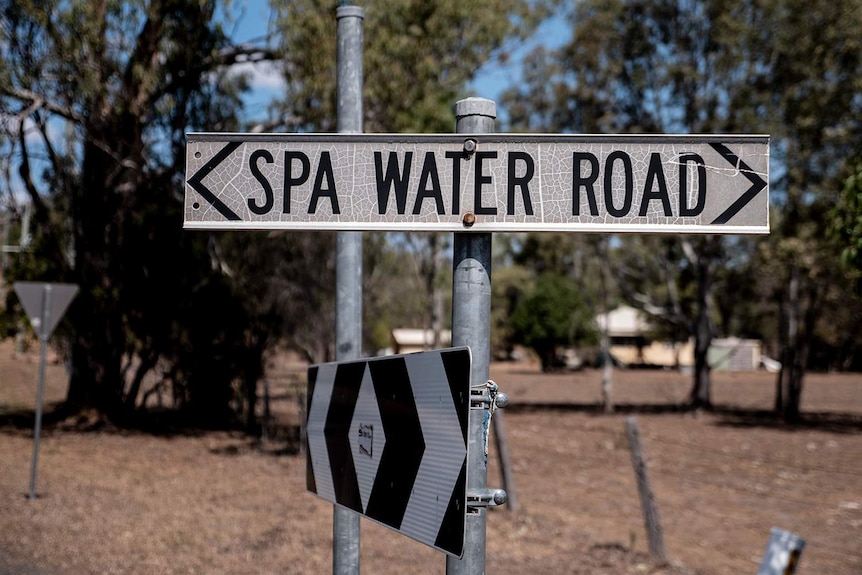 A road sign that reads  'Spa Water Road'