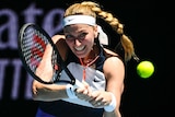 Petra Kvitová plays a double-handed backhand at the Australian Open