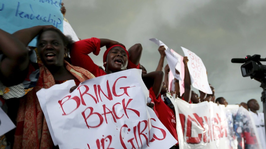 Protesters outside Nigeria's parliament demanding security forces search harder for the missing schoolgirls.