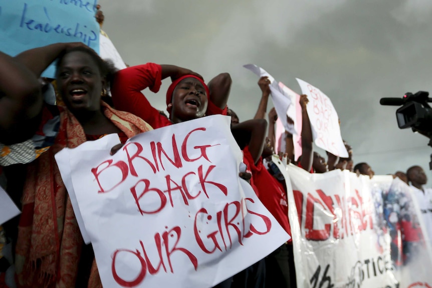 Protestors outside Nigeria's parliament demanding security forces search harder for the missing schoolgirls.