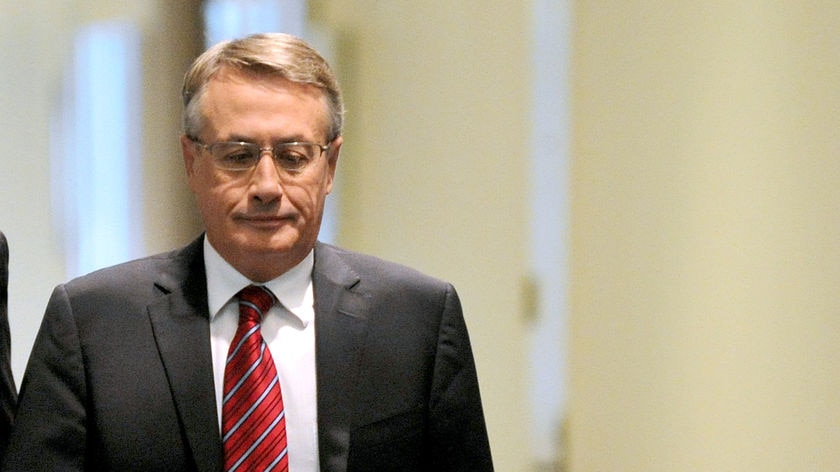 Wayne Swan speaking during a press conference