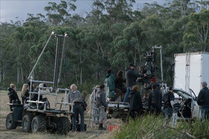 A film crew working outdoors.