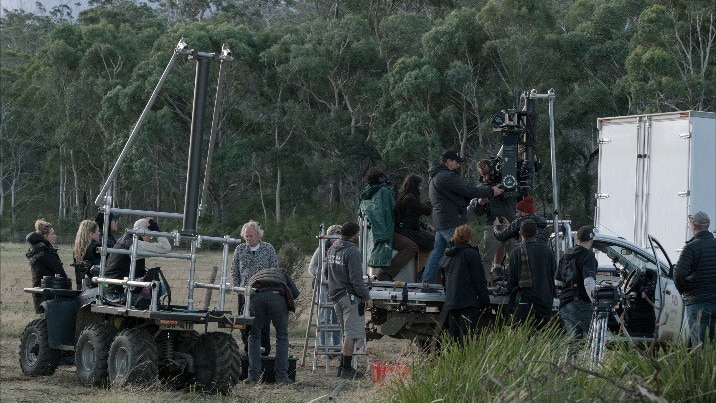 A film crew working outdoors.