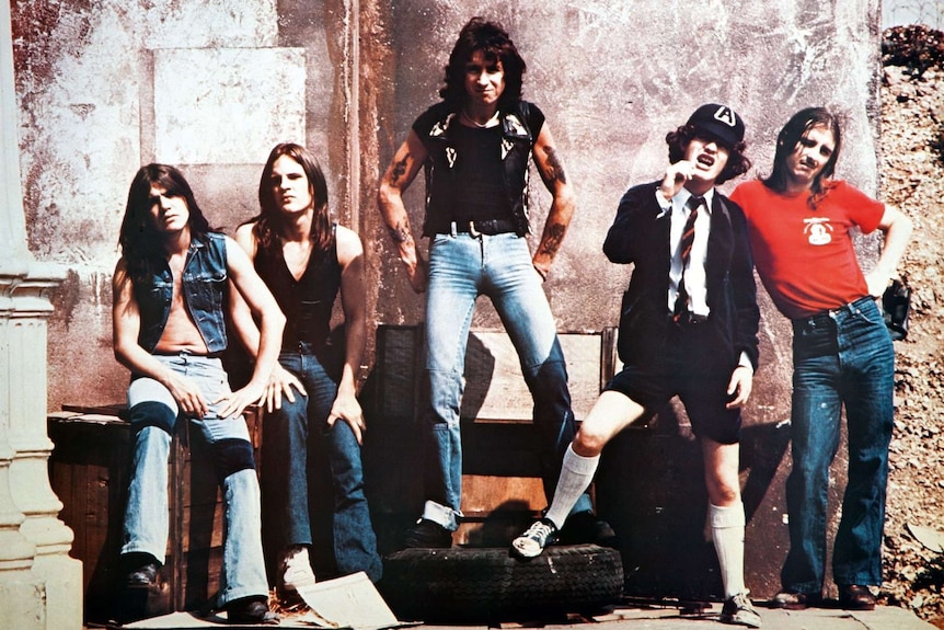 AC/DC pose for a band photo in 1976.