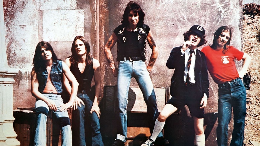 AC/DC pose for a band photo in 1976.
