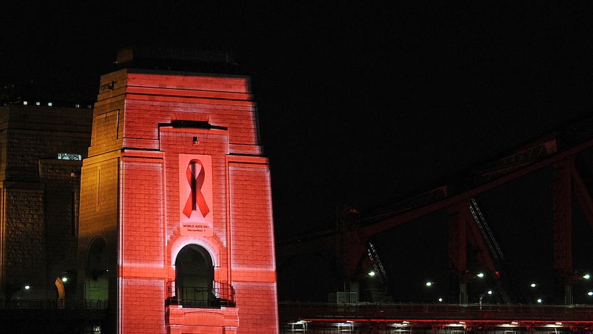 Sydney Harbour Bridge is lit up in red for World AIDS Day