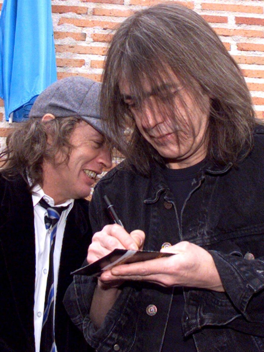 Founding members of AC/DC, LtoR Angus and Malcolm Young.