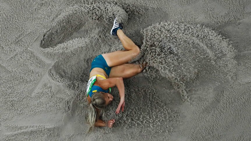 Australia's Chelsea Jaensch hits the sand while competing in the long jump at the 2016 Rio Games.