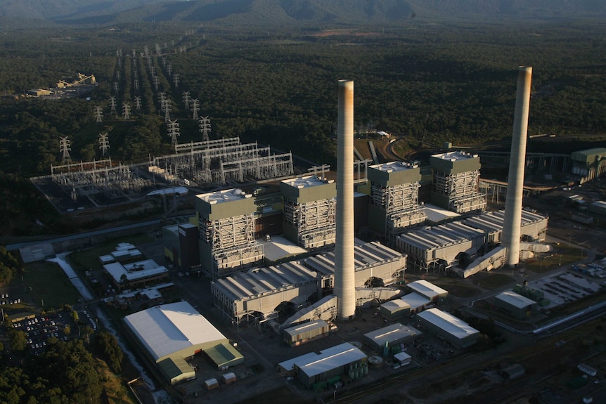 An aerial photo of a coal power plant surrounded by Australian bush.