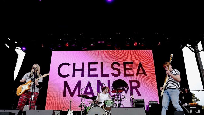 Mount Gambier three-piece Chelsea Manor perform on stage at their first-ever gig in front of thousands at One Night Stand.