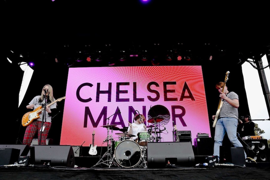 Mount Gambier three-piece Chelsea Manor perform on stage at their first-ever gig in front of thousands at One Night Stand.