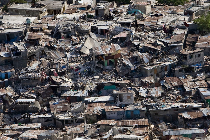 An urban area with many buildings destroyed, seen from high above