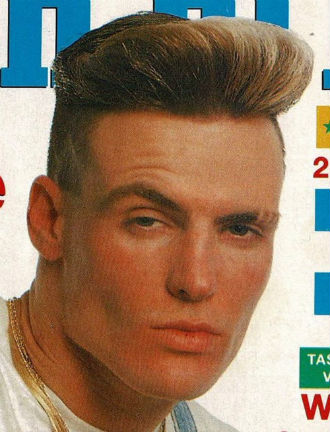 A magazine clip of a rapper with cuts in his eyebrows