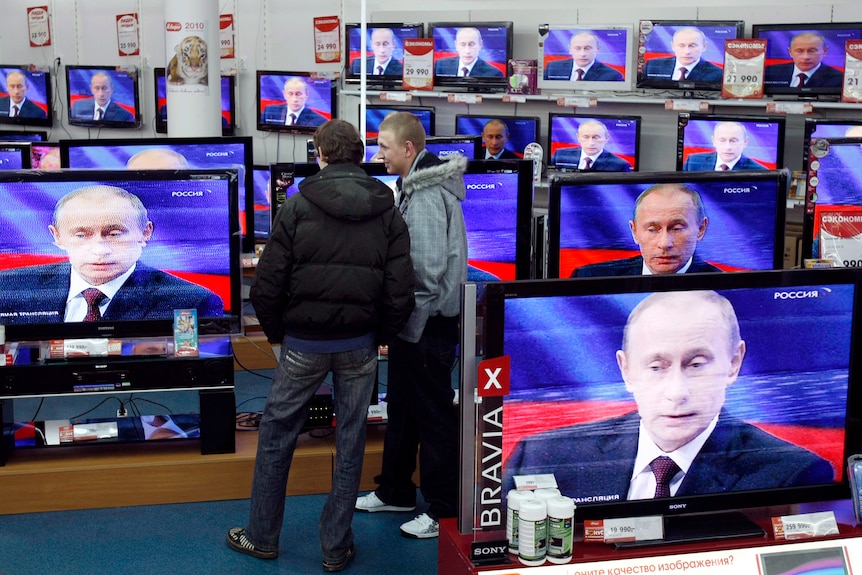 Putin on many television screens.