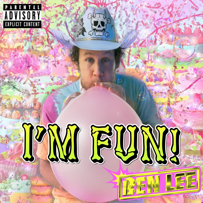 ben lee blows up a balloon wearing a cowboy hat with a skull on it wearing a tie-dye shirt