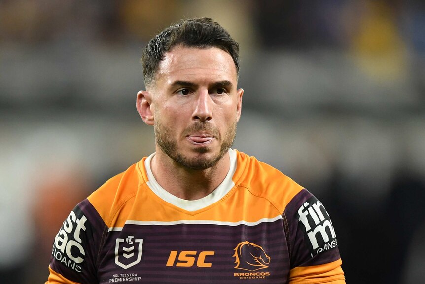 Darius Boyd looks into the distance with a disappointed expression on his face