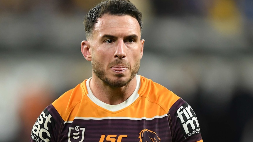 Darius Boyd looks into the distance with a disappointed expression on his face