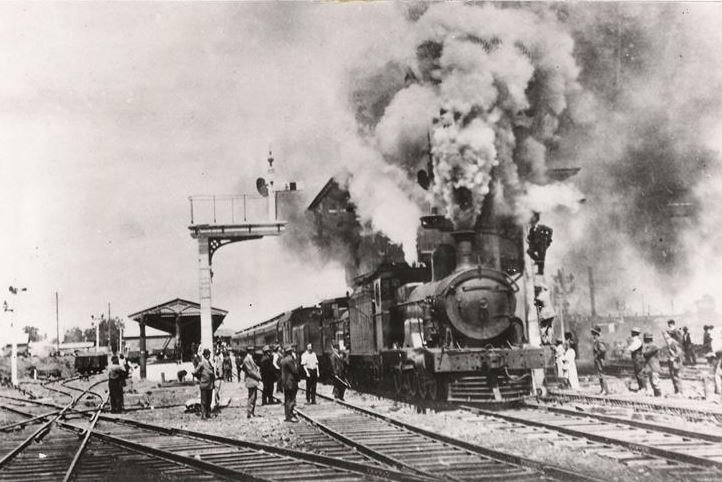 Historic image of a steam train pulling out of Kalgoorlie Railway Station in October 1917.