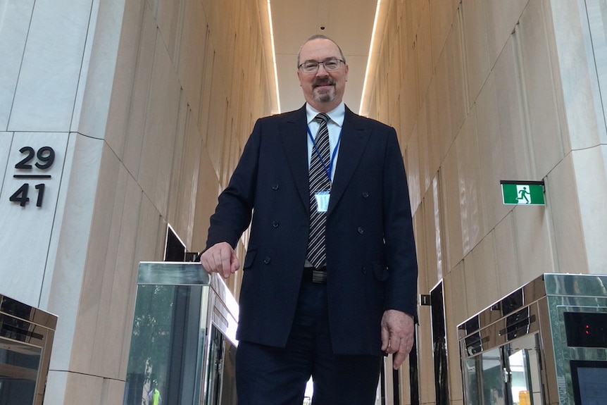 Program director Paul Krautz standing in the security entrance of the new 1 William Street project in Brisbane.