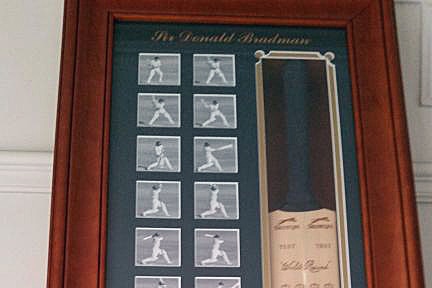 Framed bat signed by Sir Donald Bradman