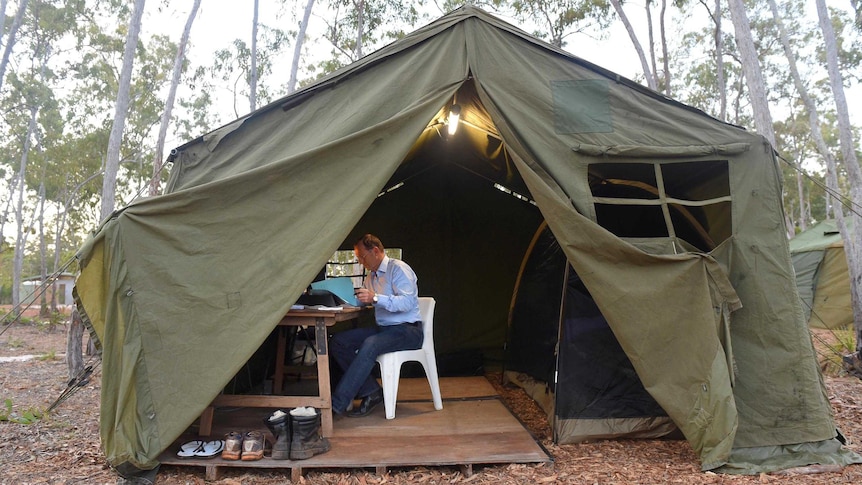 PM at work in tent