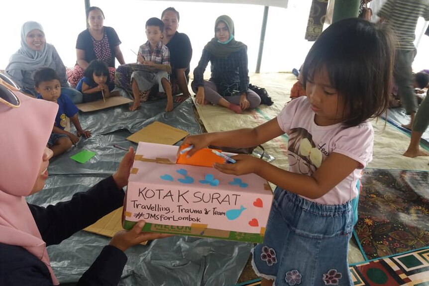An Indoensian girl in a Lombok healing camp, August 16, 2018