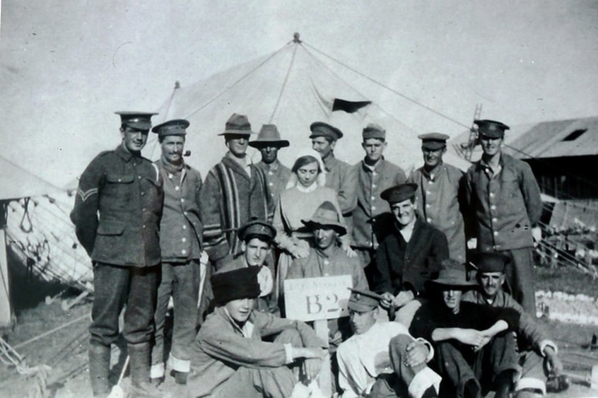 Anne Donnell pictured (centre) with Australians troops in Lemons, just under 100 km from the Gallipoli peninsula.