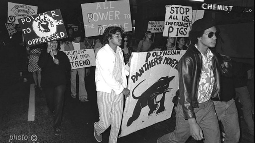 Young members of the Polynesian Panthers movement carry revolutionary placards during a protest in 1971