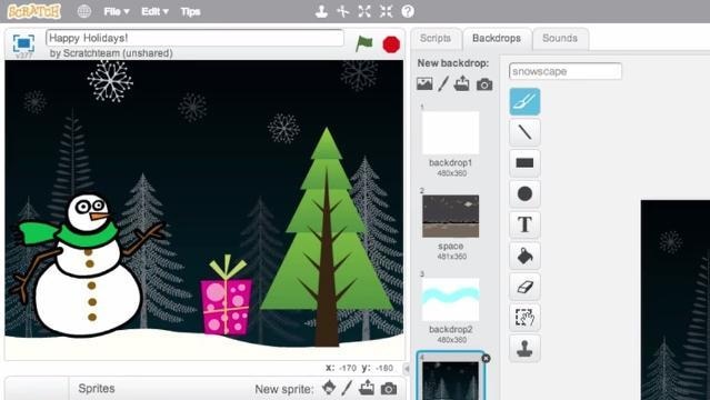 Scratch edit window shows image of snowman and tree, more trees in background