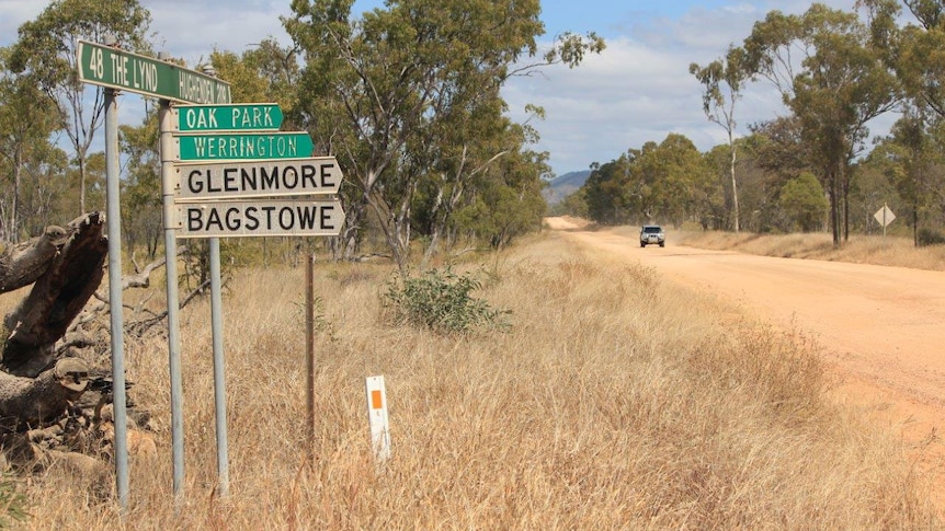 Signs on the unsealed Hann Highway