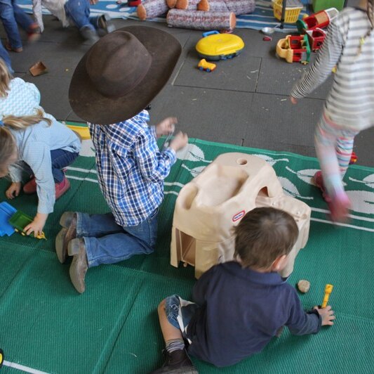 Children from farms and stations in far west New South Wales play at the Toy Library, run by the Outback Mobile Resource Unit.