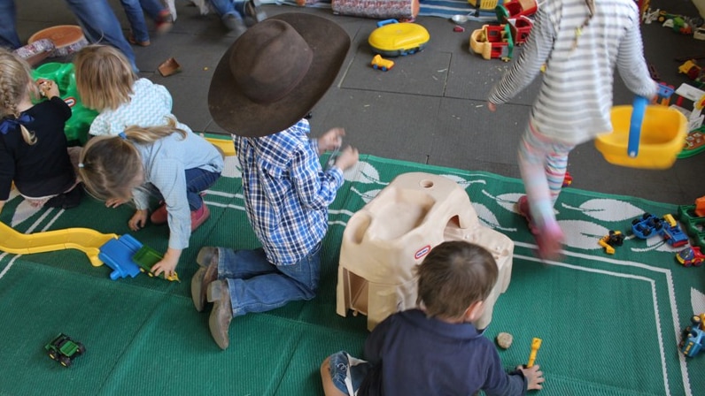 Children from farms and stations in far west New South Wales play at the Toy Library, run by the Outback Mobile Resource Unit.