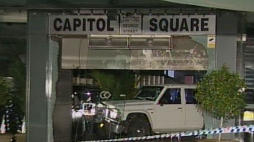 Foru wheel drive crashes through glass doors at Capitol Square