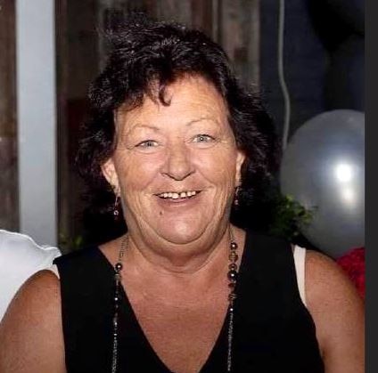 Wiman in black singlet top.