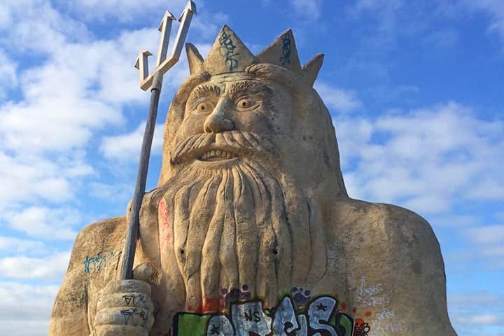 A large statue of King Neptune.