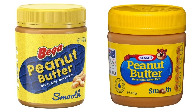 Jars of Bega and Kraft peanut butter are shown side by side, both with yellow lids and labels.
