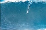Ross Clarke-Jones rides a giant wave in Nazare, Portugal.