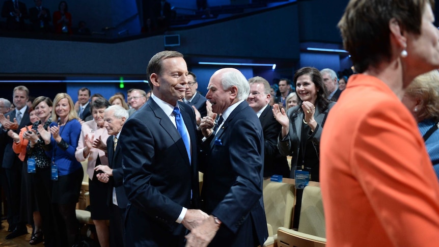 Tony Abbott greets John Howard at Coalition campaign launch