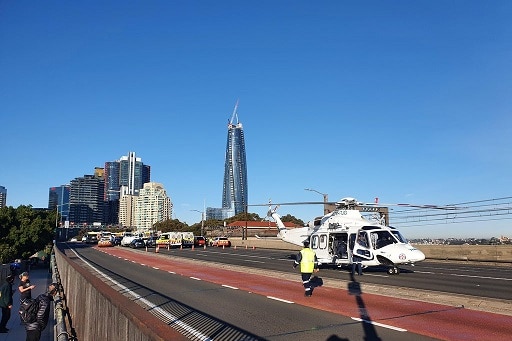 helicopter lands on harbour bridge