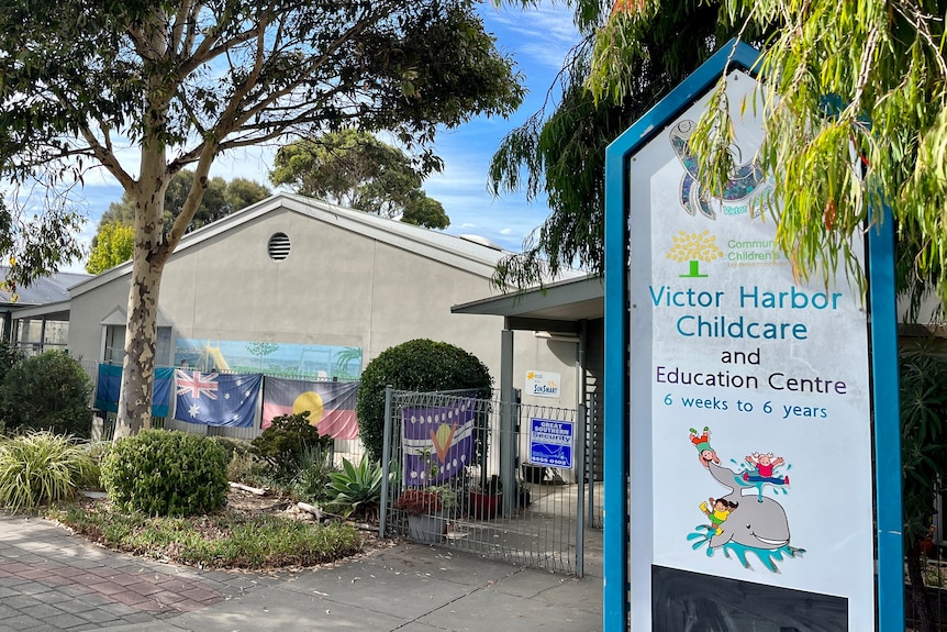 A childcare centre with a colourful mural and sign