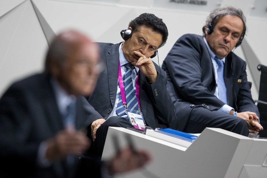 Alfredo Hawit listens to Sepp Blatter at the 65th FIFA Congress