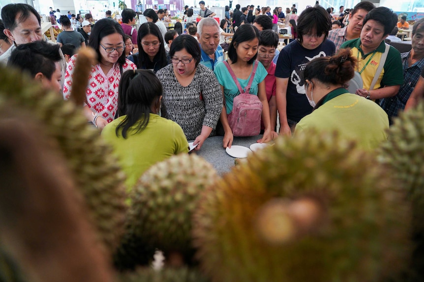 People queue for durians