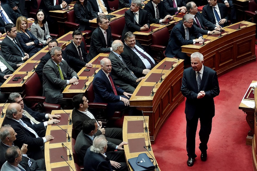 Panagiotis Pikrammenos arrives at the Greek parliament.