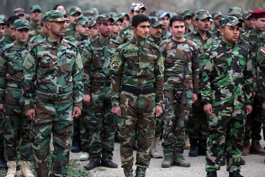 Newly-graduated Sunni fighters in the Iraqi capital Baghdad