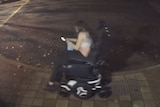 A woman on an electric wheelchair