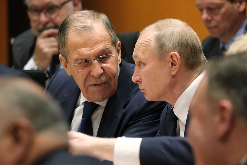 Vladimir Putin and Sergei Lavrov