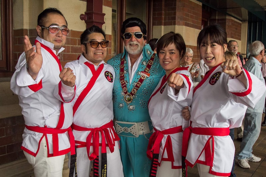Parkes Elvis Festival fans from Japan with Mayor of Parkes Shire Cr Ken Keith.
