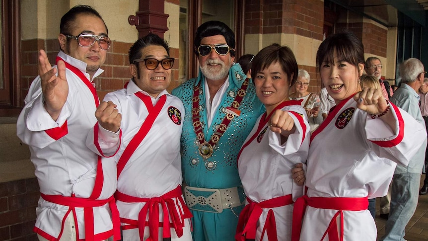 Parkes Elvis Festival fans from Japan with Mayor of Parkes Shire Cr Ken Keith.